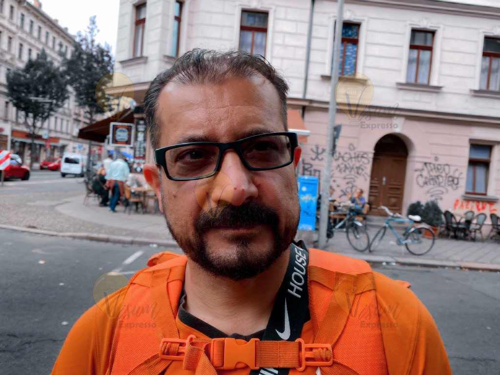 Afghanistan’s Former IT Minister Syed Ahmad Shah Sadat Spotted Delivering Pizza in Germany