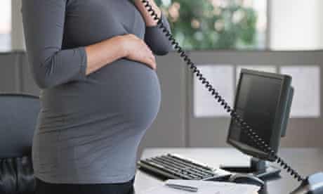Pregnant woman on the phone Call Symbolic Image
