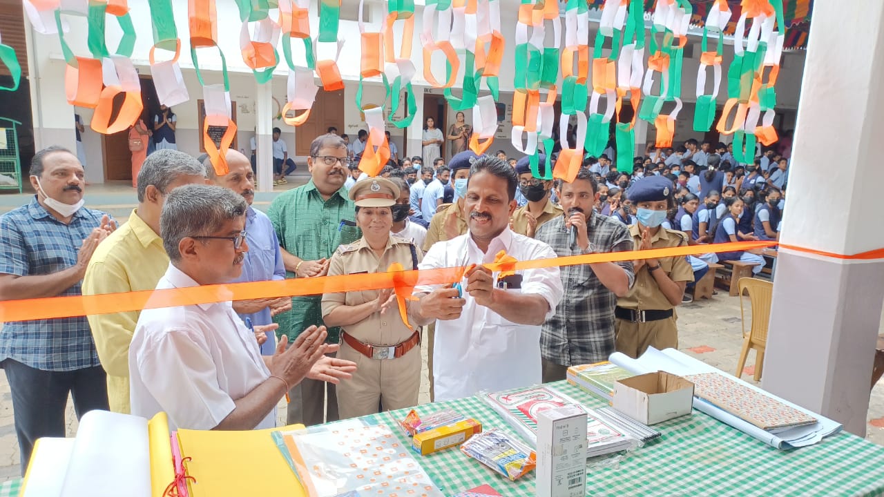 Student police cadet open honesty shop at Ramamangalam High School